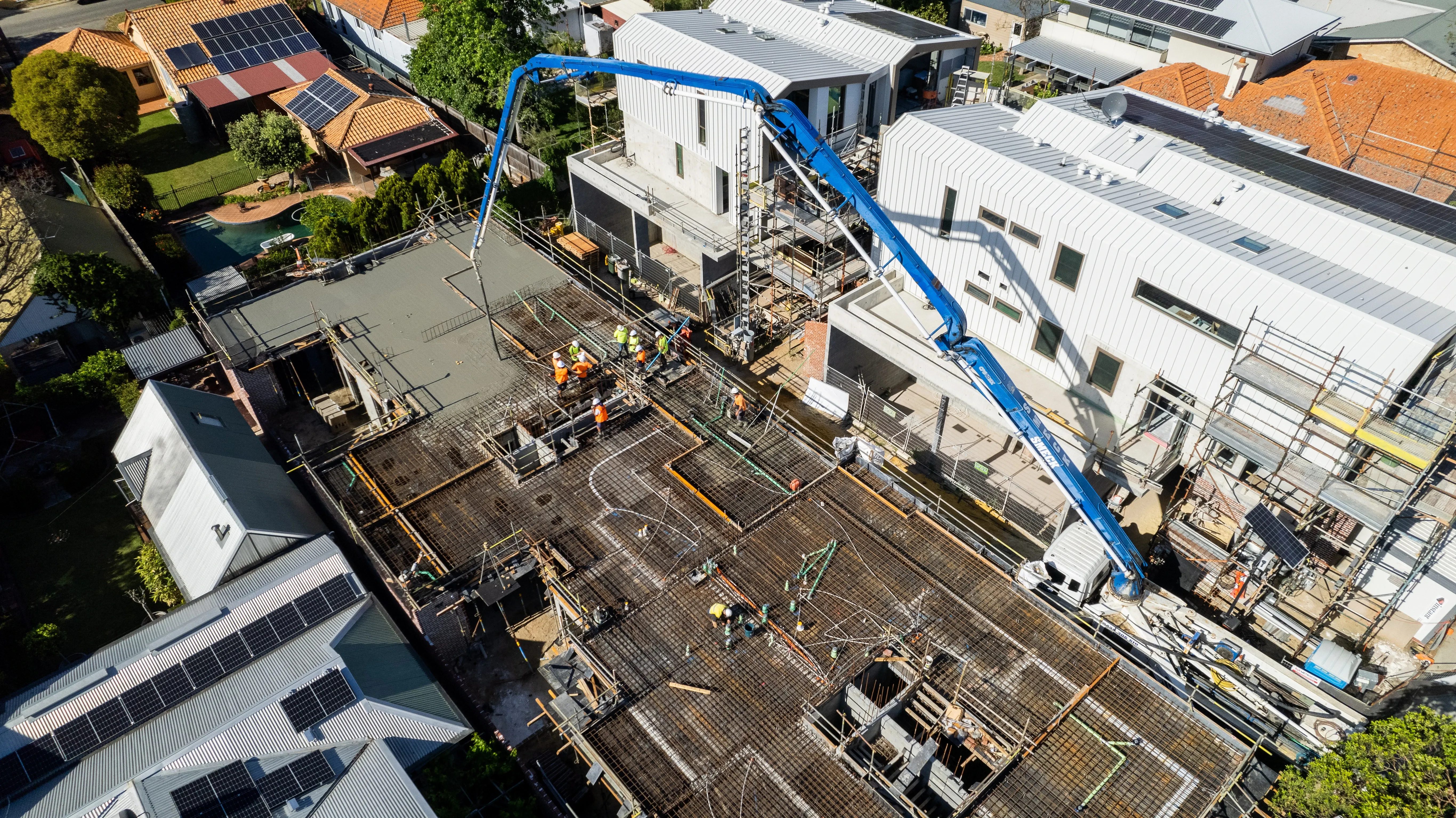 Drone shot of Metrocon team pouring concrete at Cooper Street Mews